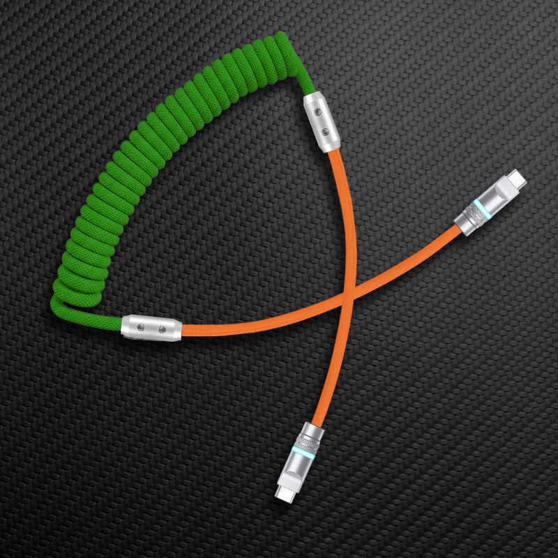 Green coiled cable with orange extension and USB-C connectors