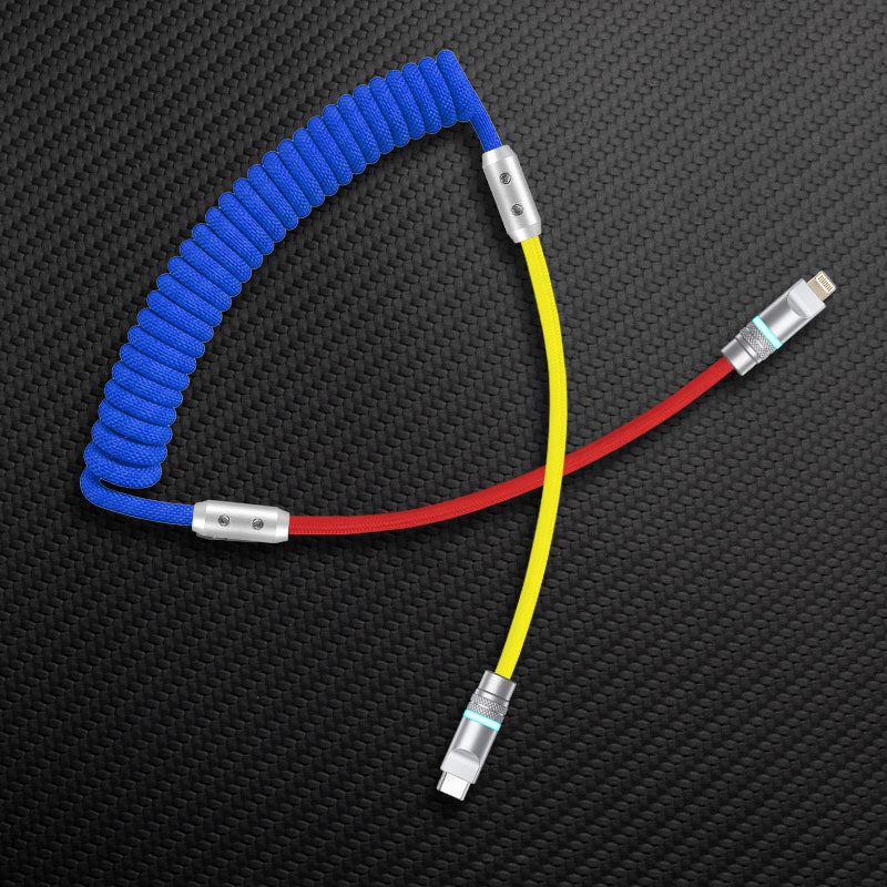 Blue, red, and yellow coiled USB-C to Lightning cable
