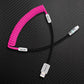 Pink and black coiled USB-A to USB-C cable
