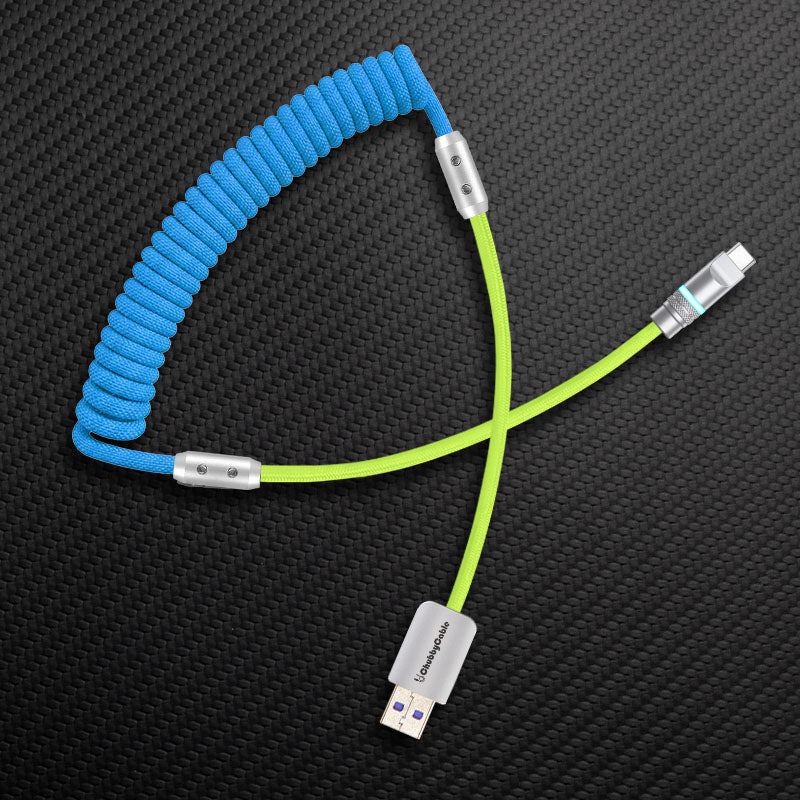 Blue coiled charging cable with lime green straight section