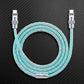 Silver Type-C braided neon charging cable neatly coiled on carbon fiber texture.
