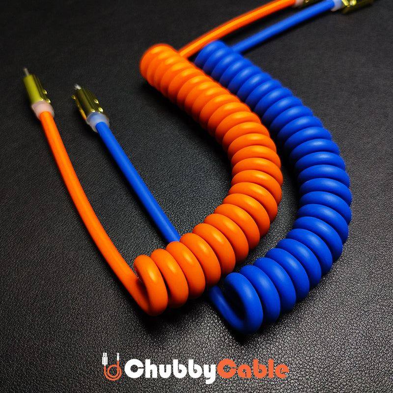 Orange and blue coiled ChubbyCable fast charging cables
