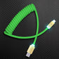 Green coiled USB-A to USB-C charging cable