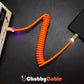 Orange ChubbyCable coiled fast charging cable in use