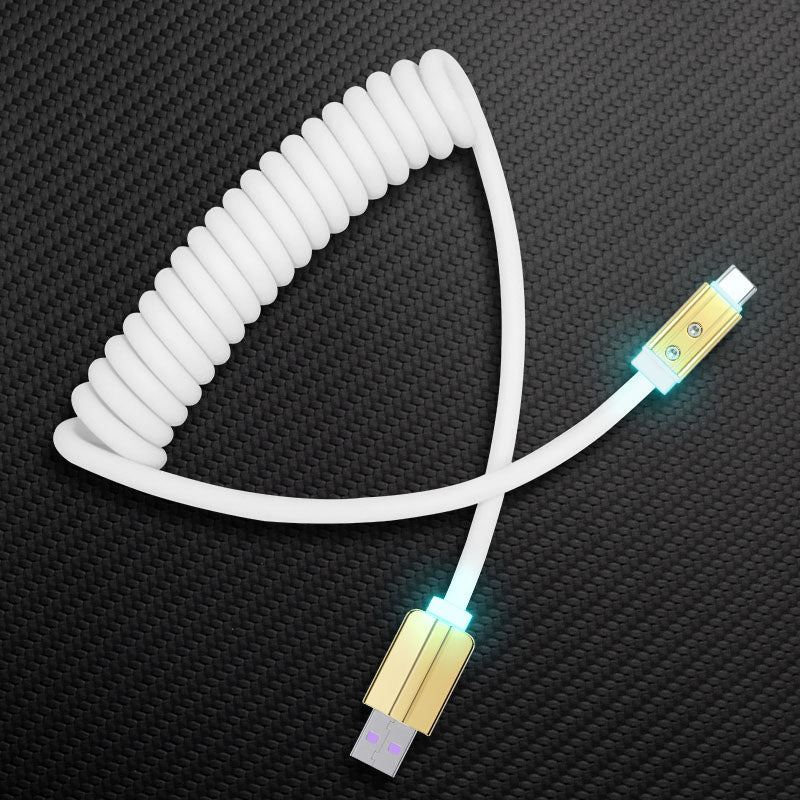 White coiled USB-A to USB-C charging cable