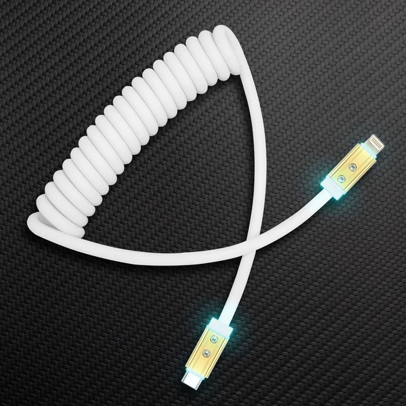 White coiled USB-A to Lightning charging cable