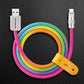 Coiled rainbow USB-A to USB-C fast charging cable with a yellow leather strap.