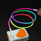 Rainbow gradient USB-C cable charging a wireless power bank.