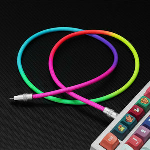 Colorful braided rainbow USB cable plugged into a custom mechanical keyboard.