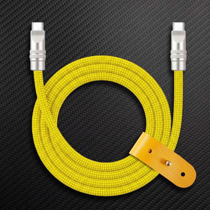 Yellow polka dot braided dual USB-C cable with leather organizer strap.