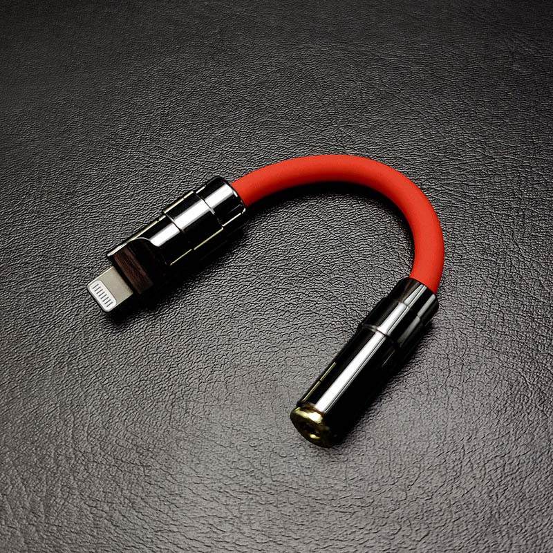 Red Lightning to 3.5mm headphone jack adapter with black metallic shell