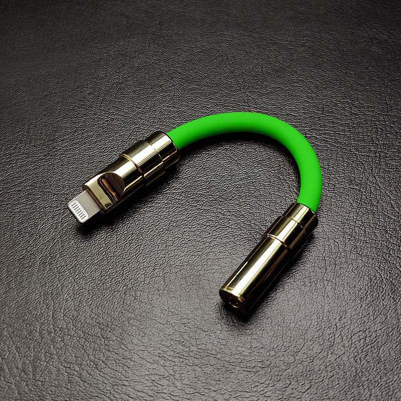 Green Lightning to 3.5mm headphone jack adapter with gold finish