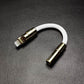 White Lightning to 3.5mm headphone jack adapter with gold finish