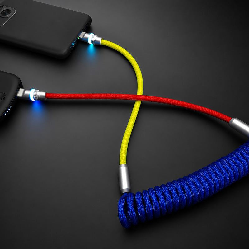 Multicolor coiled USB cable charging two devices